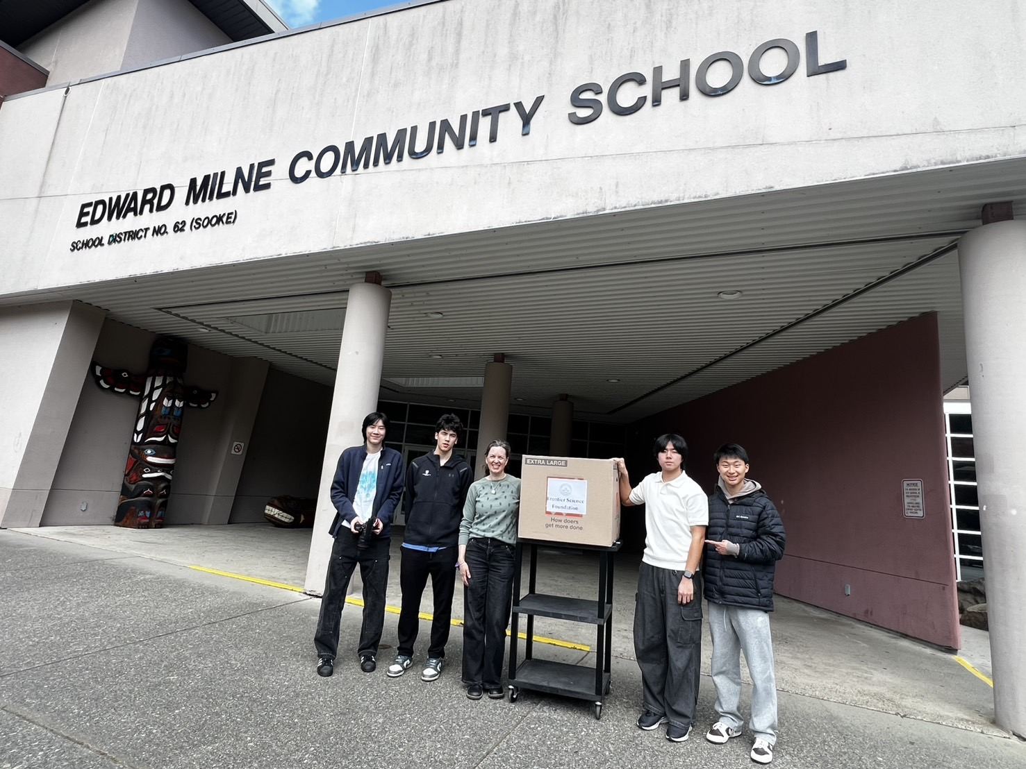 The FSF team with donation boxes outside Edward Milne Community School